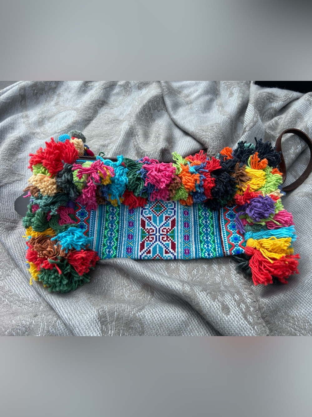 Handcrafted Multicolor Boho Clutch with Tassel Trim